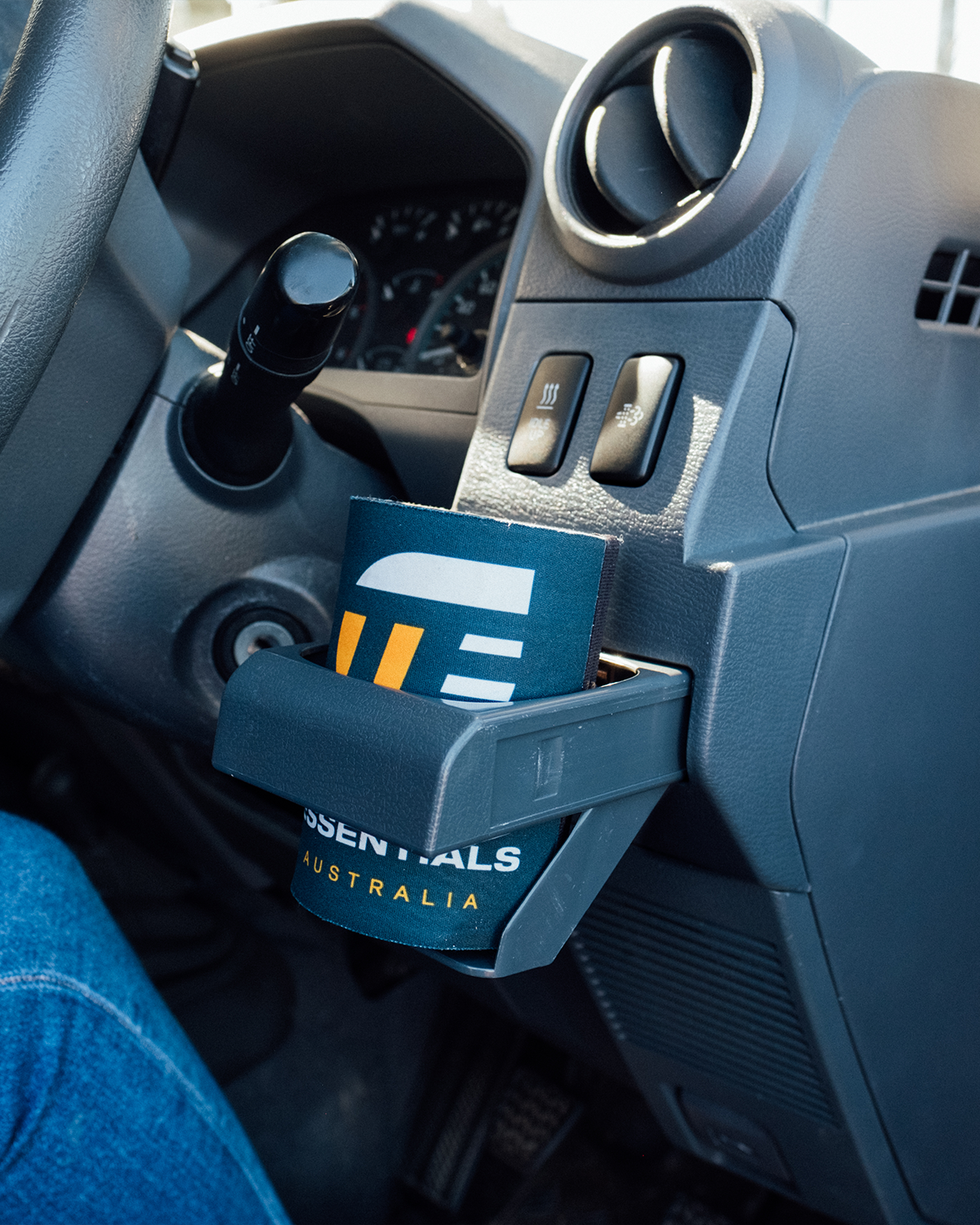70 series cup holder, drivers side. 79 series cup holder