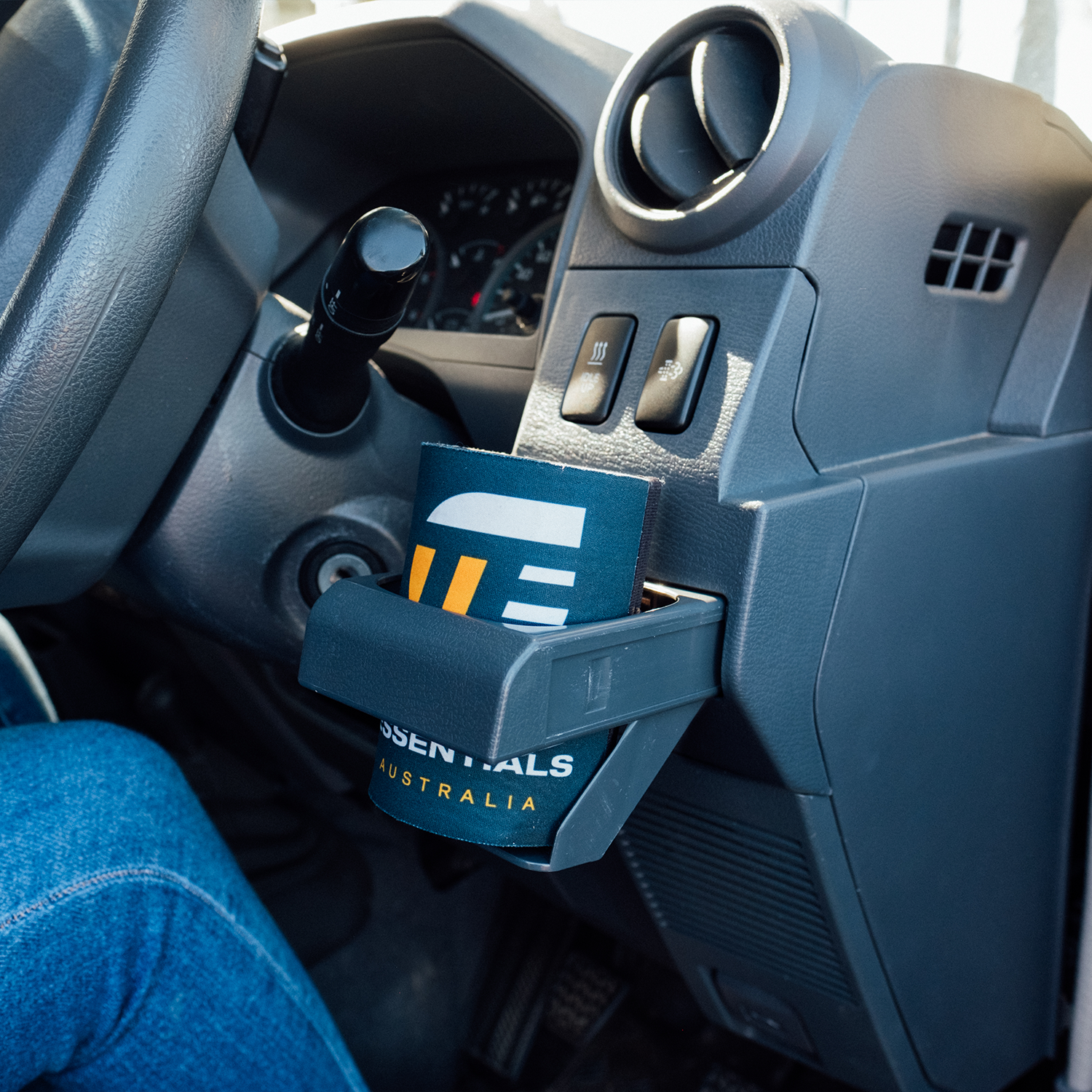 70 series cup holder, drivers side. 79 series cup holder