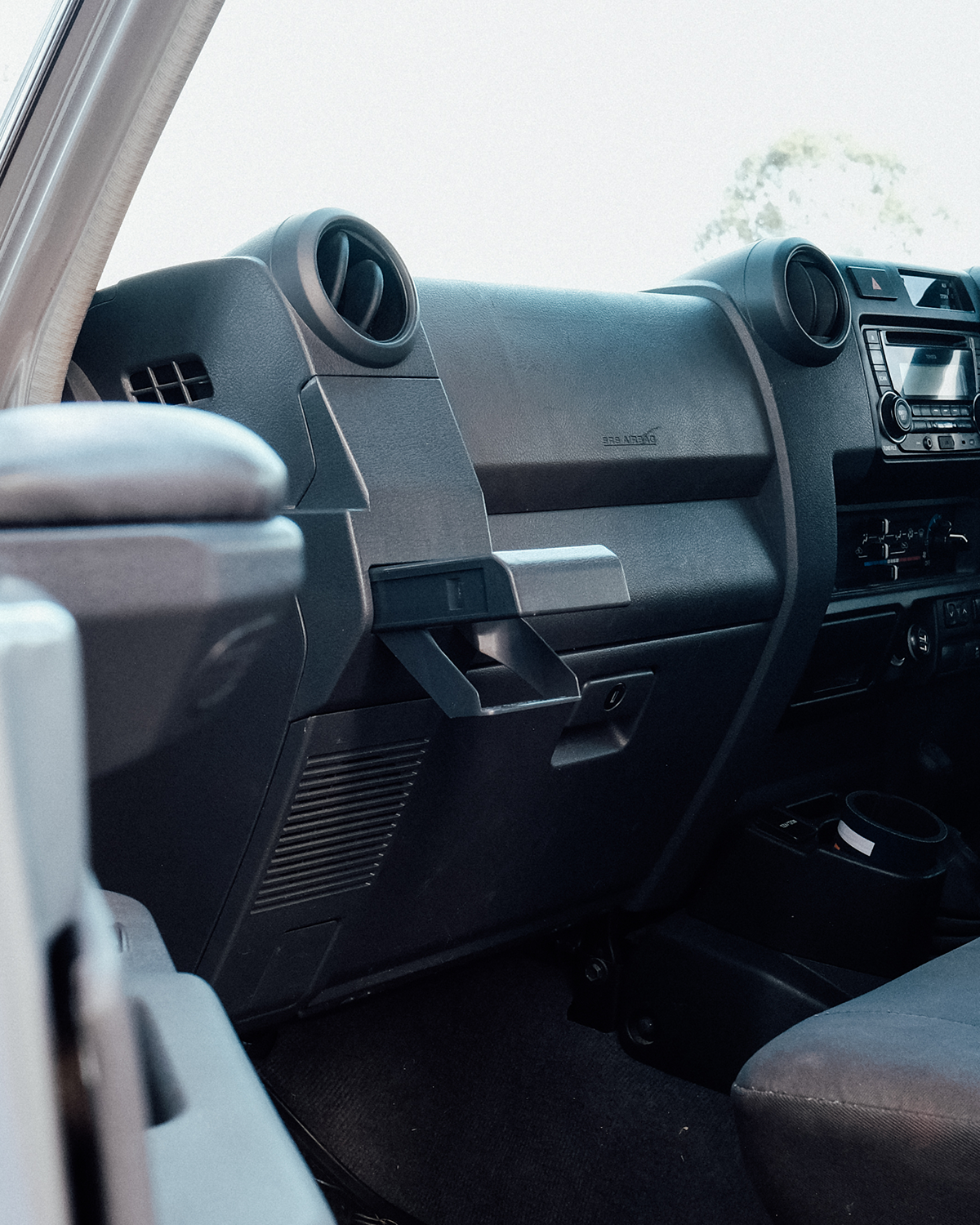 70 series cup holder, passenger side. 79 series cup holder. passenger side cup holder