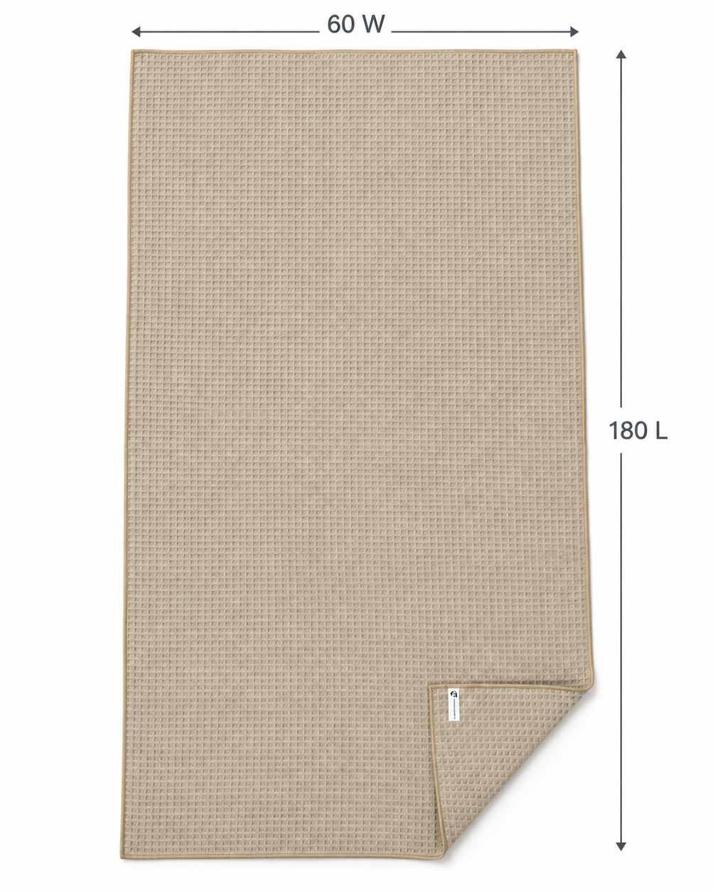 beige bath towel, waffle texture laid flat