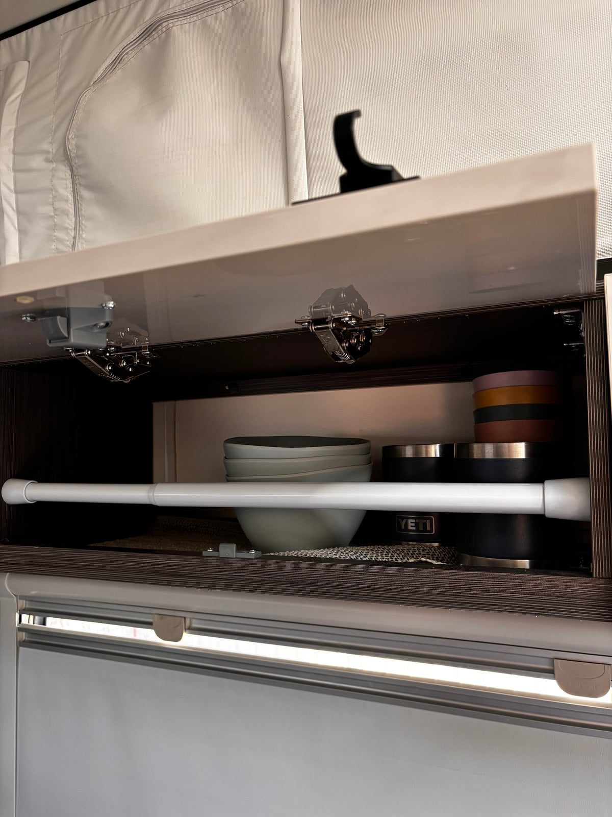 How to stop things falling out of caravan cupboards: 7 fixes that work