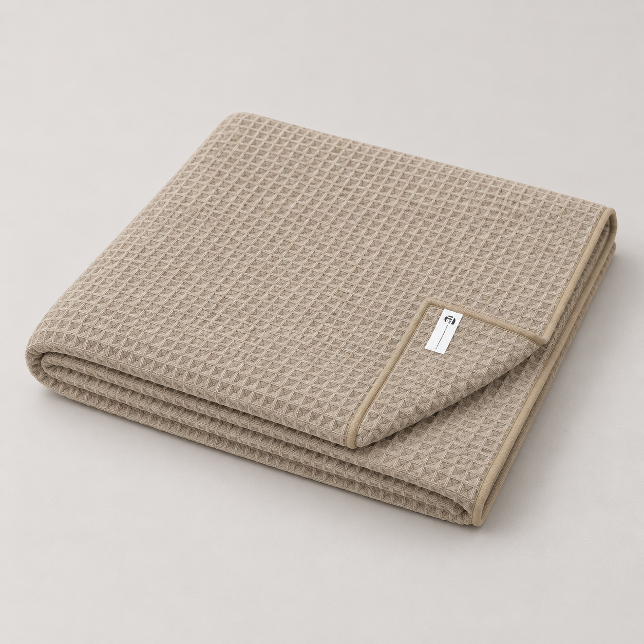 beige bath towel folded