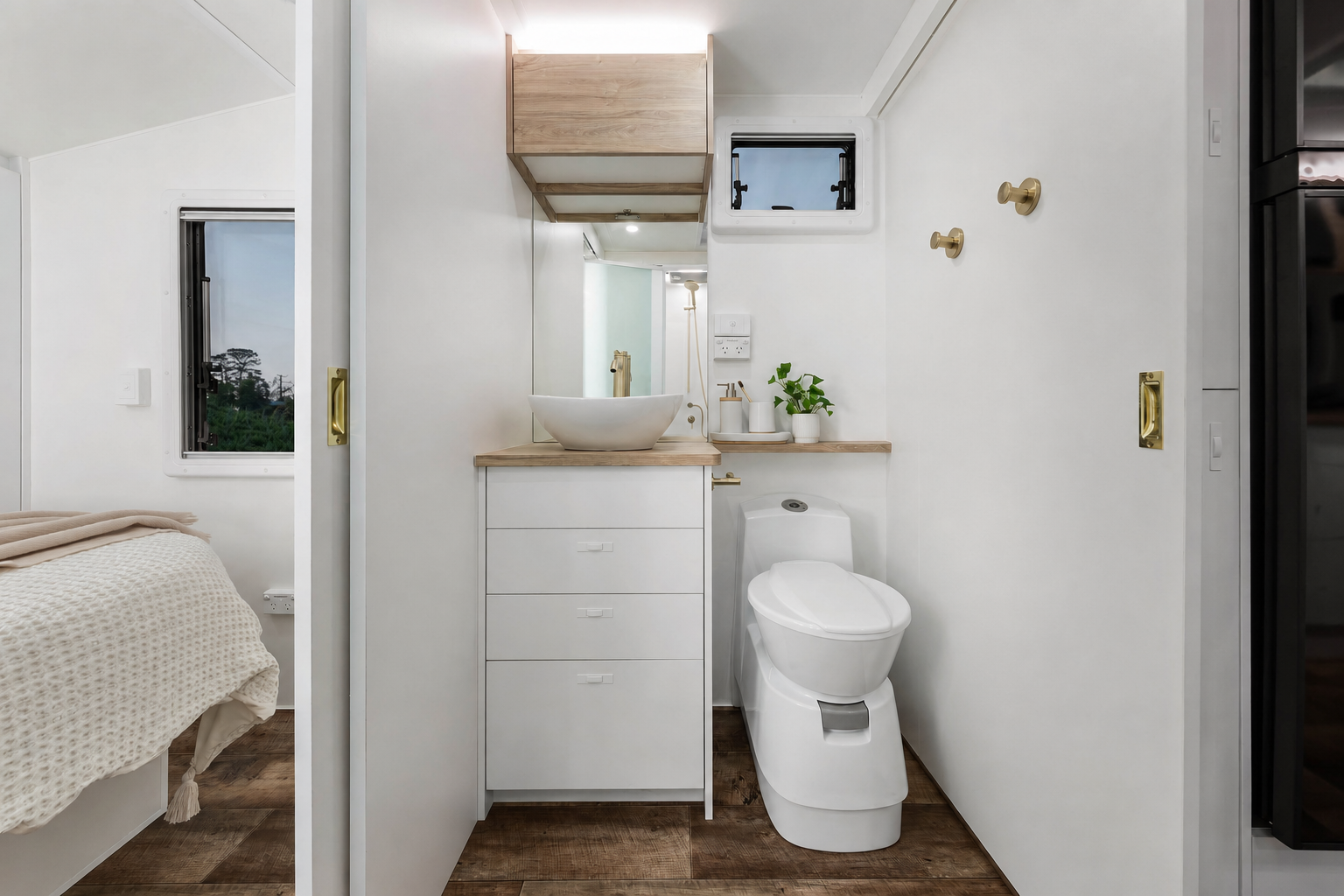 Gold hook in a caravan bathroom