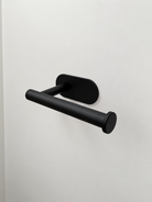 black toilet roll holder